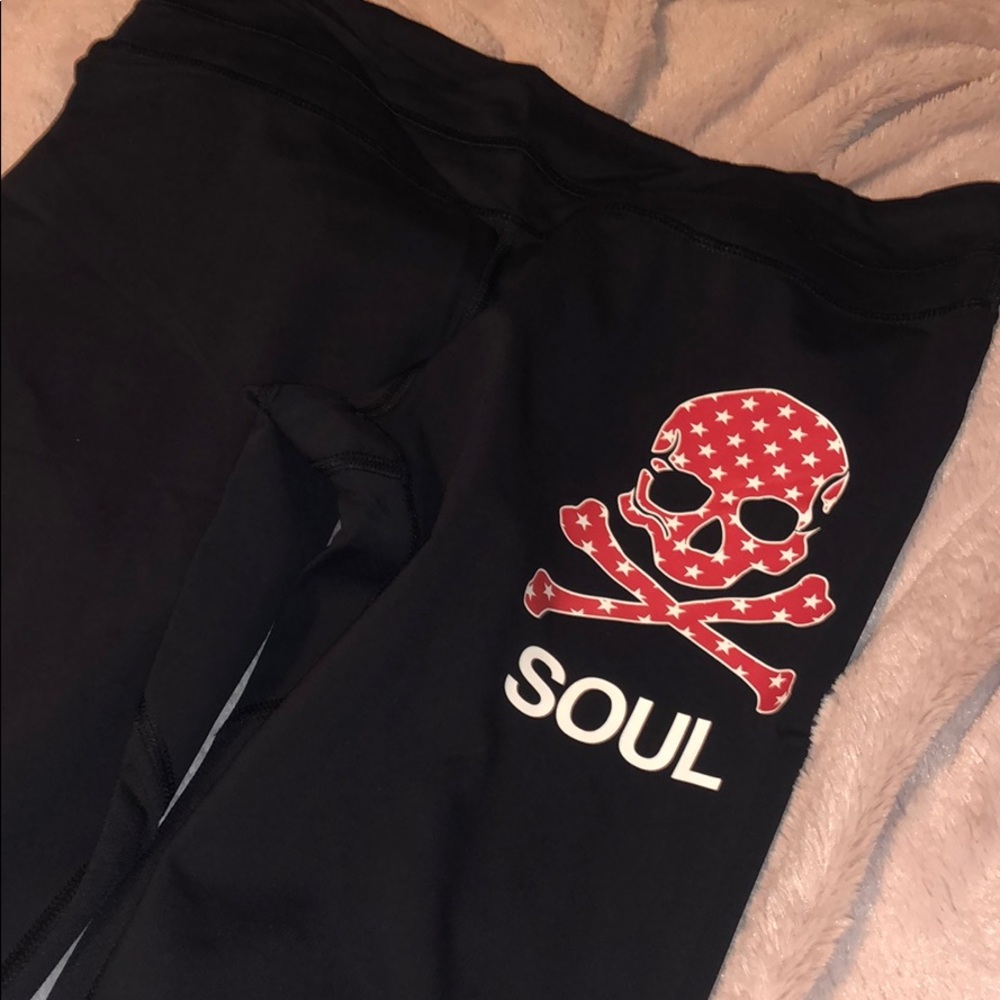 EUC Lululemon for SoulCycle black crops red stars
